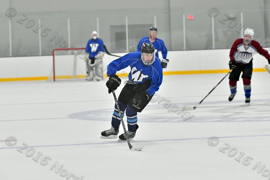 Wheaton College Men\'s Ice Hockey vs Middlesex Community College. - Photo By: KEITH NORDSTROM